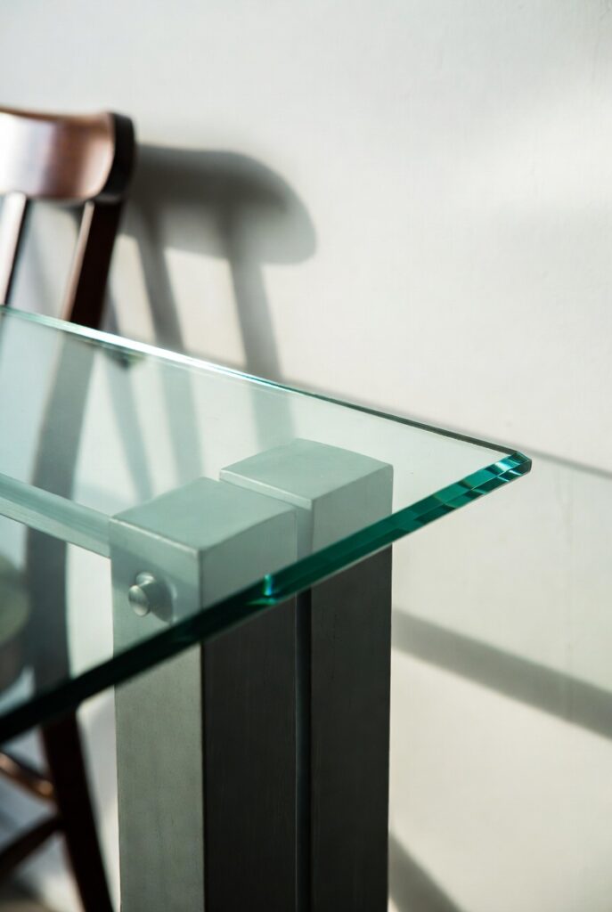 Beveled edge glass table