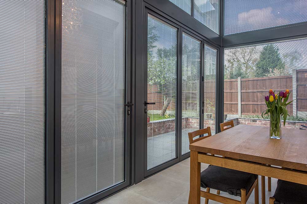 Dining room with integral blinds for privacy