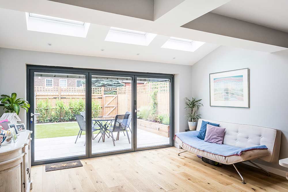 Living room with integral blinds within patio door